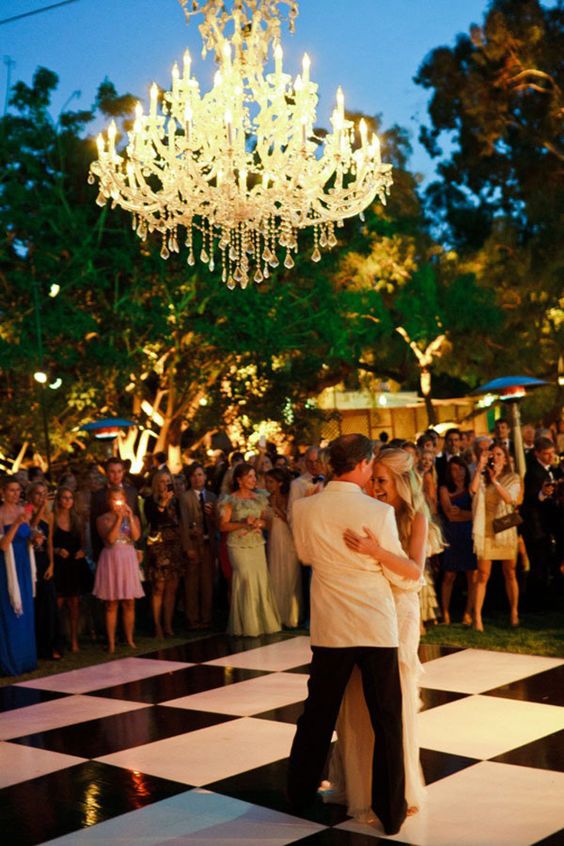 Outdoor black and white dance floor for wedding
